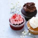 Easter-themed cake decorated with colorful icing, sprinkles, and chocolate eggs