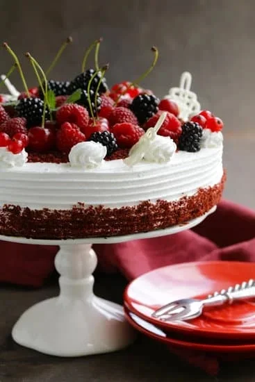 Decorate a cake stand with a dome: fresh flowers, ribbons, or edible decorations
