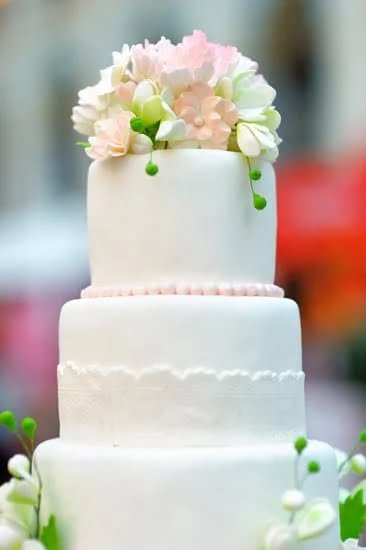 Tiny edible embellishments on cake decorations are commonly referred to as extension work dots