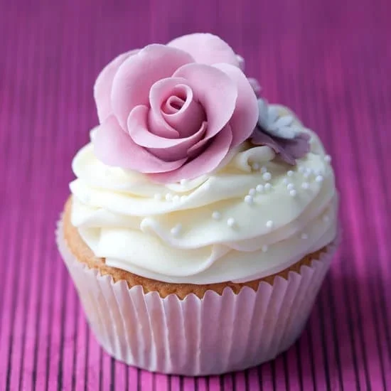 Colorful cake with intricate decorations and frosting, showcasing exceptional cake decorating skills