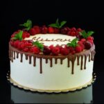 Decorating a Lemon Blueberry Cake Image of a beautifully decorated lemon blueberry cake with luscious frosting and vibrant fruit toppings