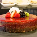 Decadent chocolate truffle cake with elegant decorative icing for a lavish celebration