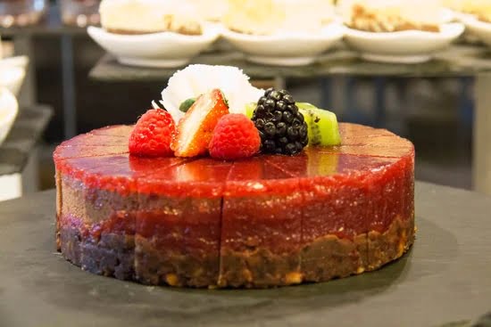 Decadent chocolate truffle cake with elegant decorative icing for a lavish celebration