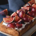 Decorating Cake With Fruit Deliciously decorated cake adorned with fresh and vibrant assortment of fruits