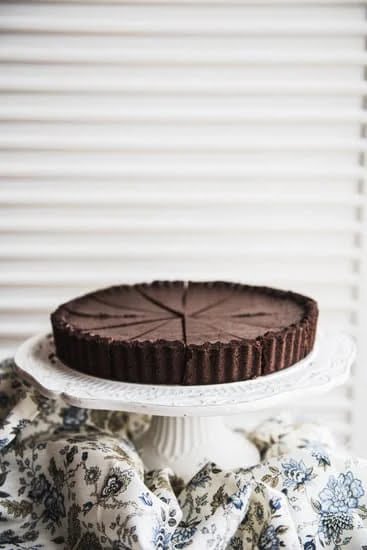 Image of a beautifully decorated cake with the number 3 made of icing on top