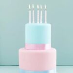 Ways to Decorate a Red Velvet Cake Slices of a beautifully decorated red velvet cake adorned with cream cheese frosting and edible flowers