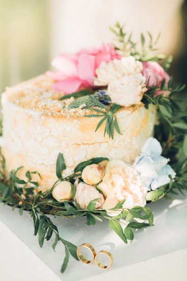 Step-by-step guide on attaching marzipan decorations to a cake for a perfect finish