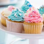 Poker chip-shaped cake decorations in vibrant colors for casino-themed parties or poker enthusiasts