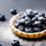 Edible Sugar Decorations for Cakes Colorful and intricately designed edible sugar decorations for cakes, perfect for adding an elegant touch