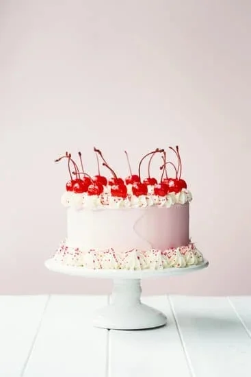 Exquisite holiday cake decorations featuring elegant Christmas-themed designs, perfect for festive celebrations