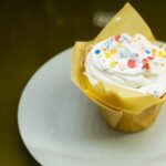 Graduation cap cake decoration: Delightful edible fondant graduation cap and scroll atop a celebratory cake
