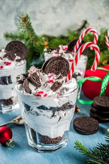 Image of the BEST DECORATED CHOCOLATE CAKE with exquisite frosting, chocolate shavings, and vibrant edible flowers