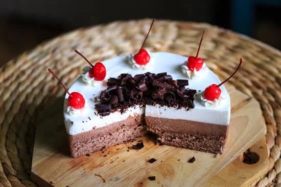 Delicious chocolate cake topped with colorful sprinkles for a delightful treat