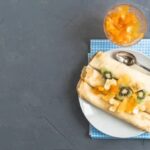 Cake Decorated With Cinnamon Sticks Cake adorned with aromatic cinnamon sticks adding a touch of warmth and flavor