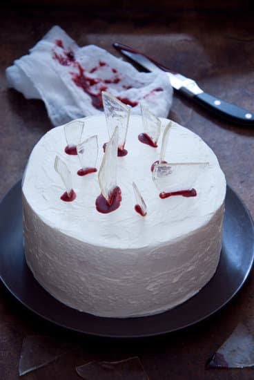 Blue and Gold Graduation Decorations Cake 1 Blue and gold cake with graduation decorations, perfect for celebrating a special milestone