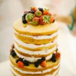 Adult Cake Decoration Colorful adult cake decoration featuring fondant figures, candles, and vibrant edible designs