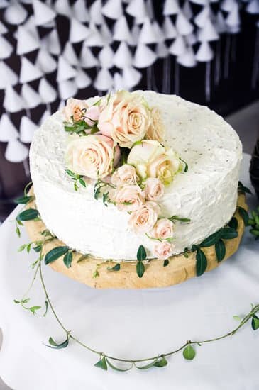 Elegant three-tier Christmas cake stand adorned with festive decorations for a stunning holiday centerpiece
