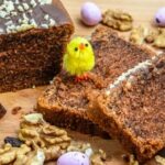 Decorate an Easter Cake Delicious Easter cake decorated with colorful pastel icing and festive chocolate eggs