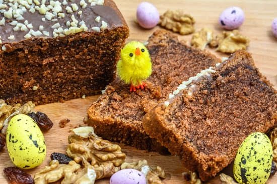 Delicious Easter cake decorated with colorful pastel icing and festive chocolate eggs