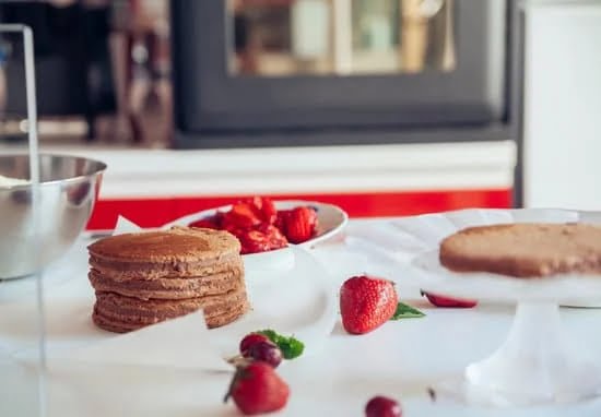 Cake Decorating Jobs 1 Skilled cake decorator creating intricate designs for special occasions, experienced in cake decorating jobs