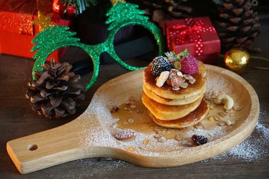 Decorate cake pops with frosting for a sweet and festive touch