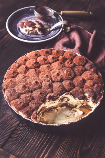 Step-by-step guide for how to decorate a lamb cake with icing and fondant