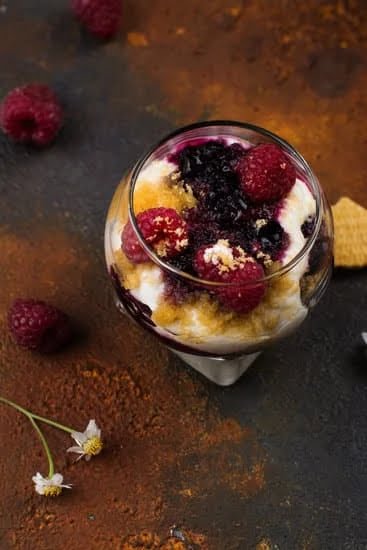 Adorable Hello Kitty cake decorated with pink bows and edible flowers