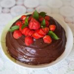 Delicious Carrot Cake Decoration with Cream Cheese Frosting and Nut Topping