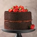 How to Decorate a Plain Cake How to decorate a plain cake with buttercream flowers and edible glitter for extra flair