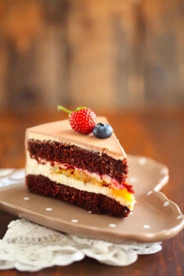 Christmas-themed carrot cake with cream cheese frosting and festive decorations, ideal for holiday celebrations