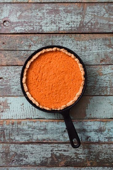 Step-by-step guide on how to decorate a cake with M&Ms for a fun and colorful finish