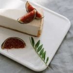 Step-by-step guide on how to decorate an apple cake with colorful frosting and fruit toppings