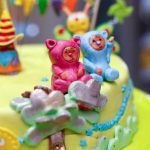 How to Decorate Roll Cake Step-by-step guide for how to decorate roll cake with icing and colorful sprinkles