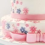 Step-by-step guide on how to decorate a Halloween cake with spooky designs and vibrant colors