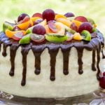 How to Decorate Banana Cake Homemade banana cake with icing and sprinkles, perfect for any occasion