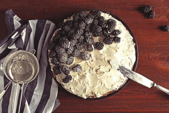 How to Decorate Coconut Cake 1 coconut shavings, toasted coconut, and edible flowers on top