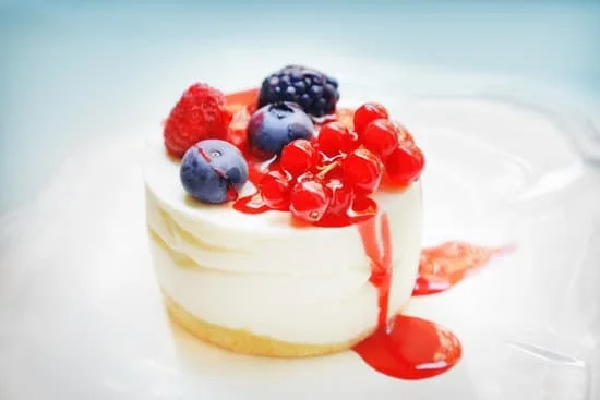 Decorating a cake with chopped nuts for a delicious, crunchy topping