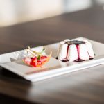 Fondant, piping tips, food coloring, cake turntable, and edible decorations