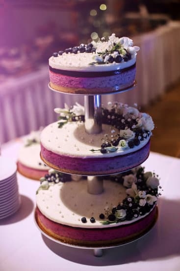 Basic cake decorating tools include piping bags, spatula, turntable, and fondant smoother