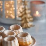 Creating spider web cake decoration using icing and toothpick technique