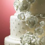 Sheet Cake Decorated Luxurious sheet cake decorated with vibrant flowers and edible glitter for special occasions