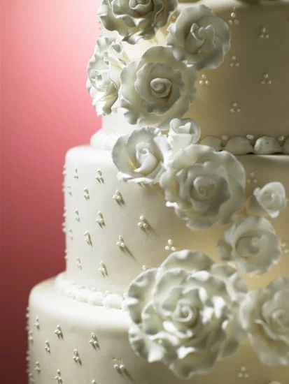 Luxurious sheet cake decorated with vibrant flowers and edible glitter for special occasions