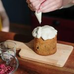 Fancy Carrot Cake Decoration Exquisite carrot cake adorned with intricate fondant decorations