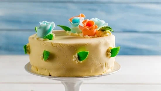 Decorating Cake With Roses 7 Decorating a cake with beautiful roses for a romantic touch and elegant finish