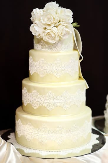 intricate piping, flower designs, and elegant swirls