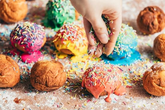 Colorful Fortnite cake decorations featuring popular in-game characters and iconic game symbols